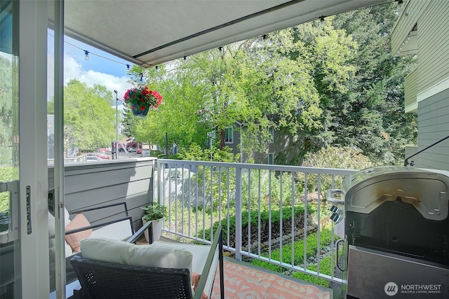 4214 W Lake Sammamish Pkwy NE Unit 202, Redmond, WA 98052 - balcony featuring a grill