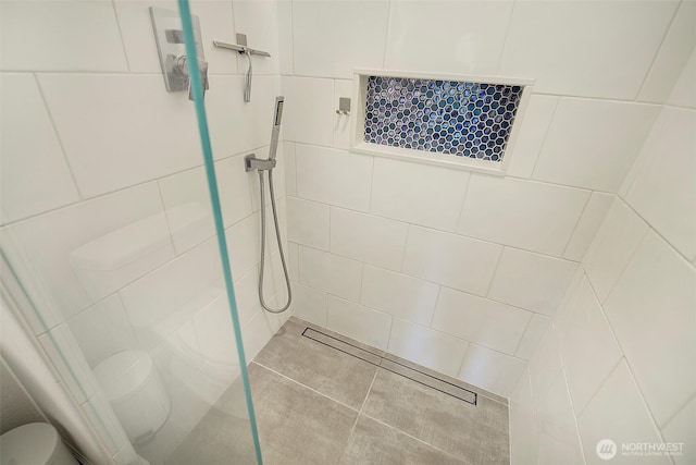 4214 W Lake Sammamish Pkwy NE Unit 202, Redmond, WA 98052 - full bathroom featuring a tile shower and toilet
