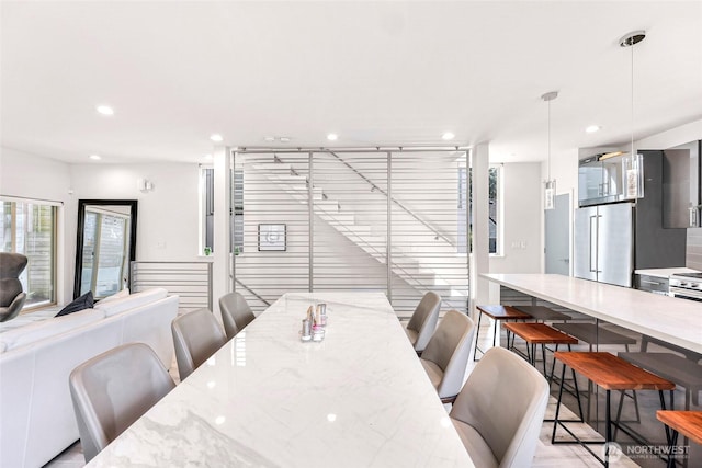 dining area with recessed lighting