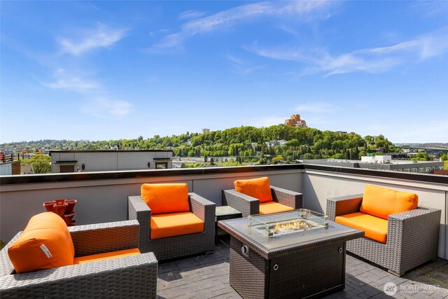 view of patio with a fire pit