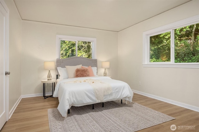 2223 NE 125th St, Seattle, WA 98125 - bedroom with light wood-style flooring and baseboards