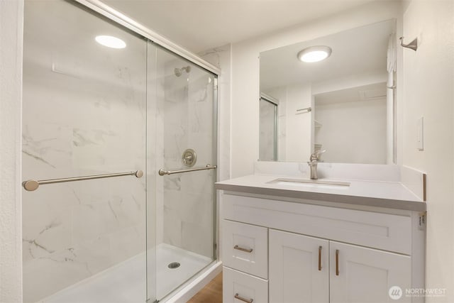 2223 NE 125th St, Seattle, WA 98125 - bathroom featuring a marble finish shower and vanity