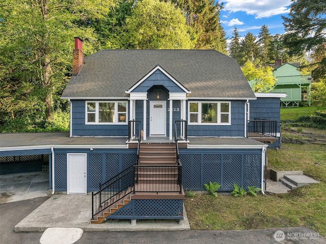 2223 NE 125th St, Seattle, WA 98125 - view of front of house with a chimney and roof with shingles