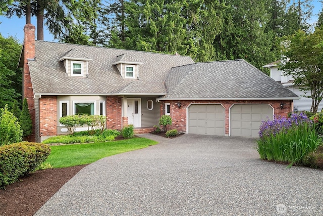 21629 NE 20th Way, Sammamish, WA 98074 - cape cod home with an attached garage, a chimney, asphalt driveway, brick siding, and a shingled roof