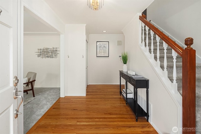 21629 NE 20th Way, Sammamish, WA 98074 - entryway featuring stairway, light wood finished floors, crown molding, and baseboards
