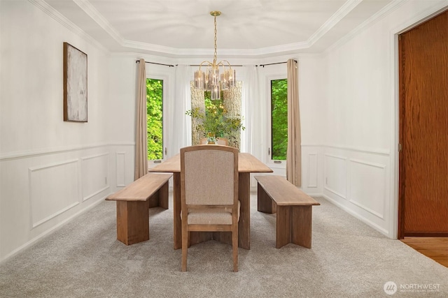 21629 NE 20th Way, Sammamish, WA 98074 - dining room with healthy amount of natural light, a decorative wall, a chandelier, carpet, and crown molding