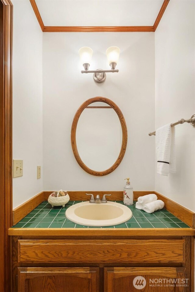 21629 NE 20th Way, Sammamish, WA 98074 - bathroom with vanity and ornamental molding