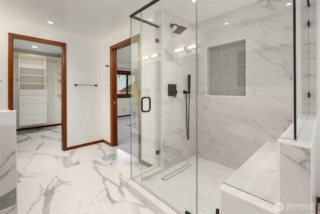 21629 NE 20th Way, Sammamish, WA 98074 - bathroom featuring a marble finish shower, marble tiled floors, recessed lighting, a spacious closet, and baseboards