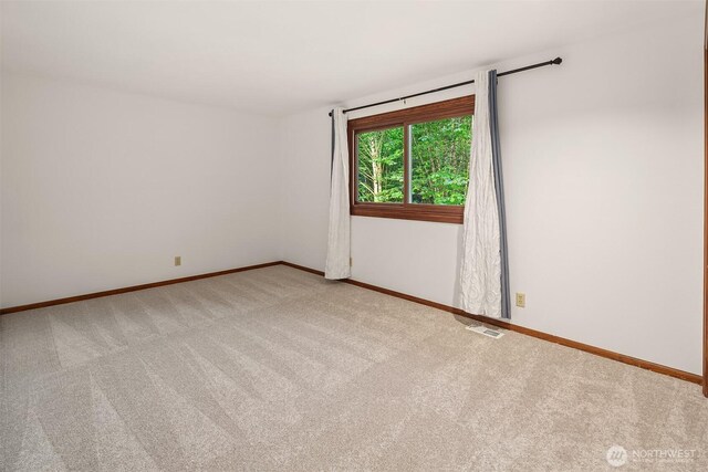 21629 NE 20th Way, Sammamish, WA 98074 - empty room with light colored carpet and baseboards