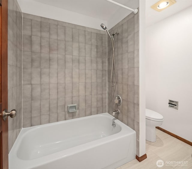 21629 NE 20th Way, Sammamish, WA 98074 - full bathroom featuring toilet, shower / bathtub combination, and baseboards
