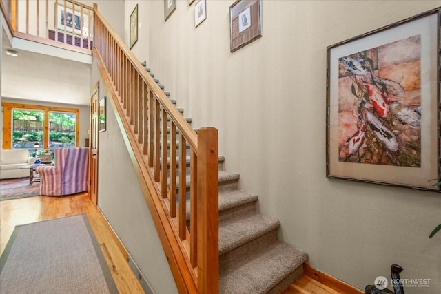 12800 NE Salmon Creek Ave Unit 118, Vancouver, WA 98686 - stairway with wood finished floors and a high ceiling