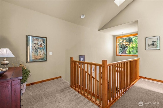12800 NE Salmon Creek Ave Unit 118, Vancouver, WA 98686 - stairs with carpet floors, lofted ceiling, baseboards, a chandelier, and a skylight