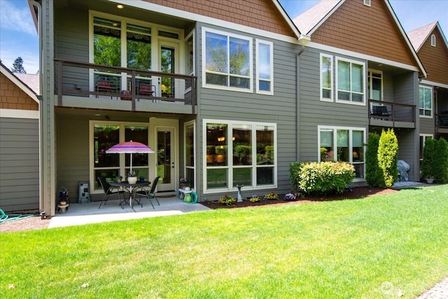 12800 NE Salmon Creek Ave Unit 118, Vancouver, WA 98686 - rear view of property with a balcony, a yard, and a patio