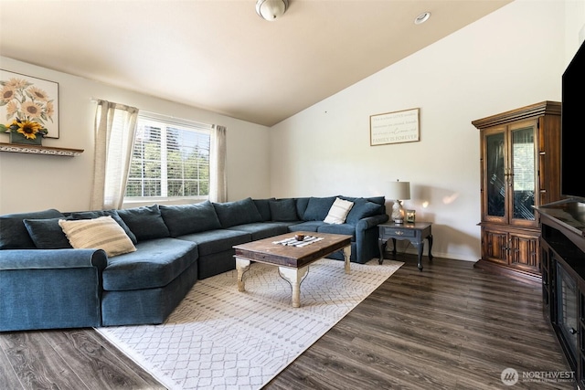 138 Bruinview Ln, Chehalis, WA 98532 - living room with vaulted ceiling, dark wood-style flooring, and baseboards