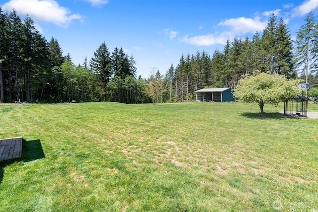 138 Bruinview Ln, Chehalis, WA 98532 - view of grassy yard with a forest view