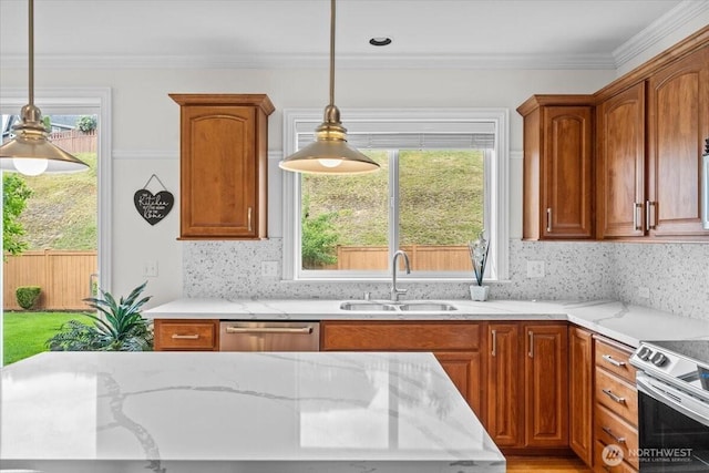 27546 254th Way SE, Maple Valley, WA 98038 - kitchen with a sink, appliances with stainless steel finishes, light stone counters, decorative light fixtures, and healthy amount of natural light