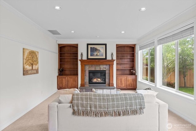 27546 254th Way SE, Maple Valley, WA 98038 - living area with carpet, a glass covered fireplace, recessed lighting, ornamental molding, and baseboards
