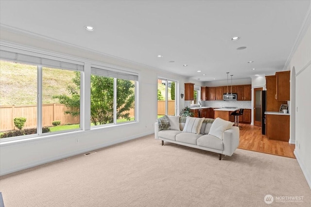 27546 254th Way SE, Maple Valley, WA 98038 - living room with light carpet, recessed lighting, ornamental molding, and baseboards