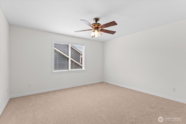 27546 254th Way SE, Maple Valley, WA 98038 - unfurnished room featuring light carpet, ceiling fan, and baseboards