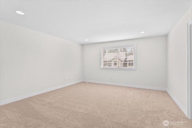 27546 254th Way SE, Maple Valley, WA 98038 - empty room with light carpet, recessed lighting, and baseboards