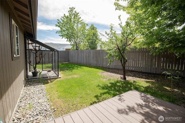 view of yard with a deck