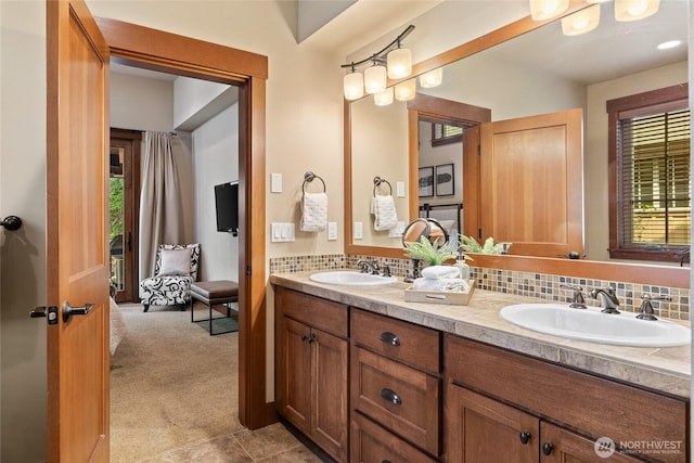 221 Cake Box Ln, Cle Elum, WA 98922 - bathroom featuring double vanity and backsplash