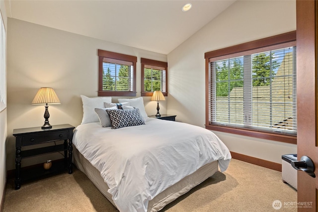 221 Cake Box Ln, Cle Elum, WA 98922 - carpeted bedroom featuring multiple windows, vaulted ceiling, and recessed lighting
