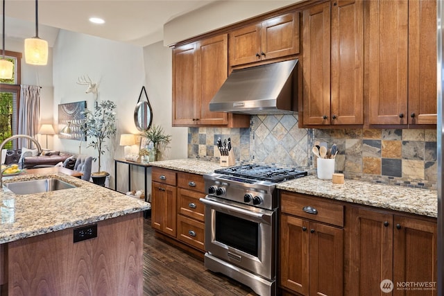 221 Cake Box Ln, Cle Elum, WA 98922 - kitchen with range hood, stainless steel range, dark wood-style flooring, brown cabinets, and recessed lighting