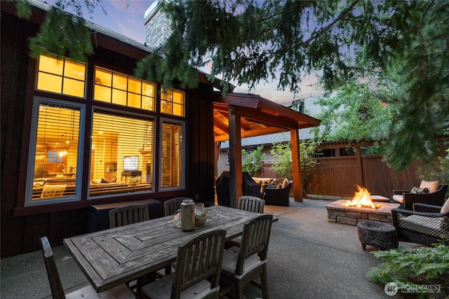 221 Cake Box Ln, Cle Elum, WA 98922 - patio terrace at dusk featuring a fire pit and a patio area