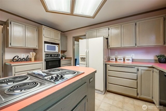 1117 W Racine St, Bellingham, WA 98229 - kitchen with white appliances, light countertops, and ornamental molding