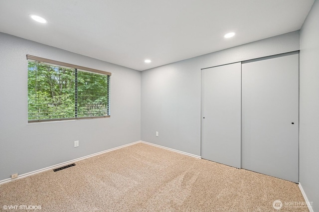 22434 SE Auburn-Black Diamond Rd, Black Diamond, WA 98010 - unfurnished bedroom featuring carpet flooring, recessed lighting, and a closet