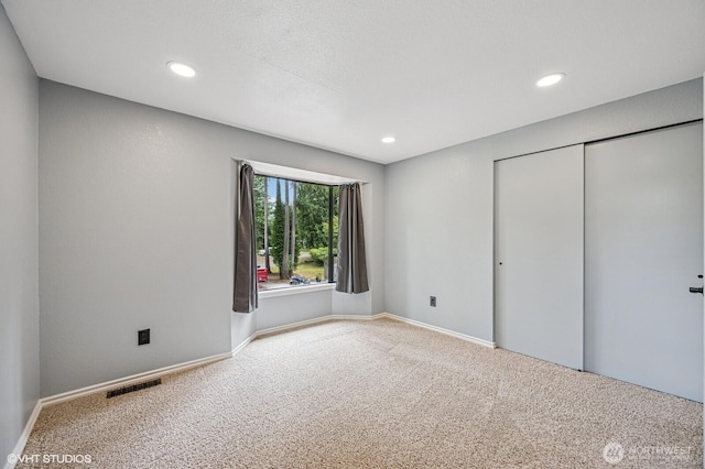 22434 SE Auburn-Black Diamond Rd, Black Diamond, WA 98010 - unfurnished bedroom with carpet floors, recessed lighting, and a closet