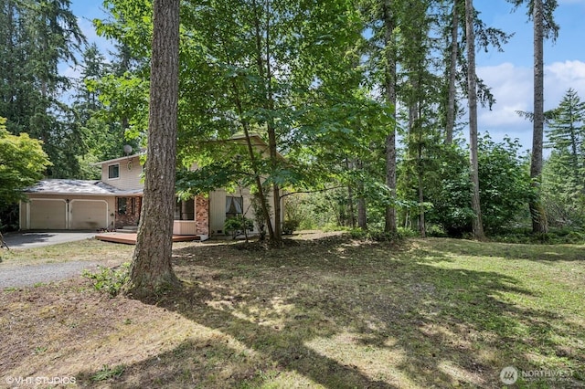 22434 SE Auburn-Black Diamond Rd, Black Diamond, WA 98010 - view of yard with an attached garage and driveway