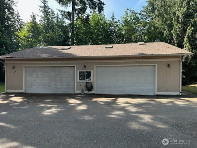 22434 SE Auburn-Black Diamond Rd, Black Diamond, WA 98010 - detached garage featuring view of scattered trees