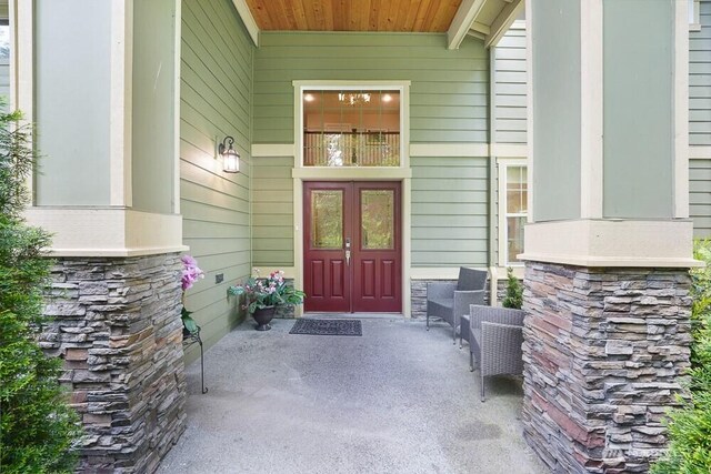 733 222nd Pl NE, Sammamish, WA 98074 - entrance to property featuring stone siding and a porch