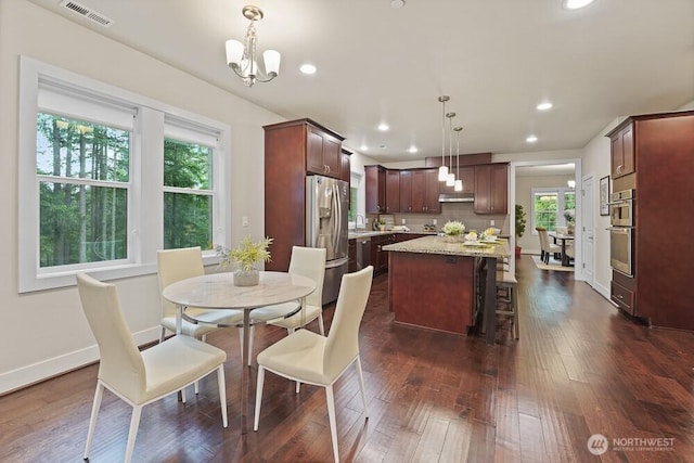 733 222nd Pl NE, Sammamish, WA 98074 - dining area with dark wood-style flooring, recessed lighting, baseboards, and a chandelier