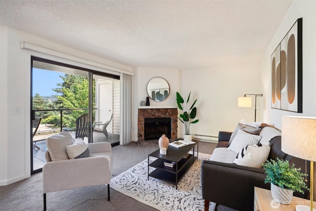 living area featuring a baseboard radiator, carpet floors, a textured ceiling, a fireplace with raised hearth, and baseboards
