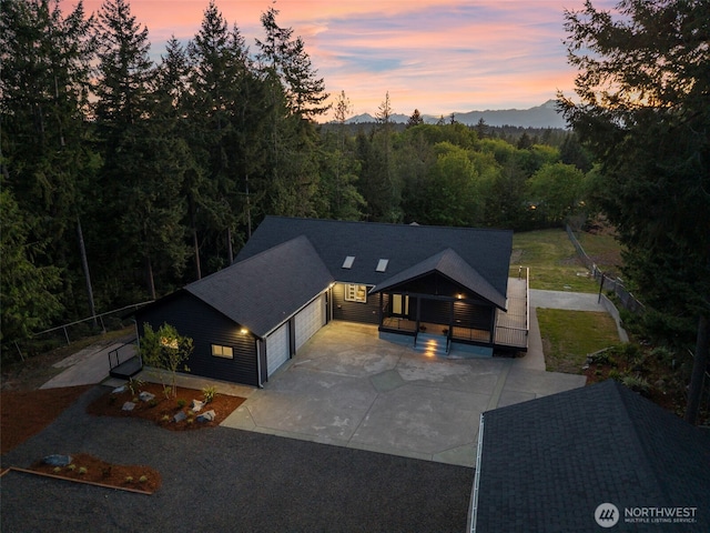 9371 Willamette Meridian Rd NW, Silverdale, WA 98383 - aerial view at dusk of a wooded view