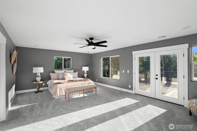 9371 Willamette Meridian Rd NW, Silverdale, WA 98383 - carpeted bedroom with french doors, multiple windows, access to exterior, and baseboards