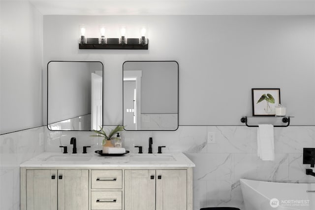 9371 Willamette Meridian Rd NW, Silverdale, WA 98383 - full bathroom featuring double vanity, a freestanding bath, and tile walls