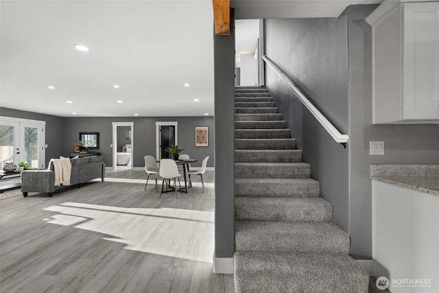 9371 Willamette Meridian Rd NW, Silverdale, WA 98383 - staircase with wood finished floors, recessed lighting, french doors, and baseboards