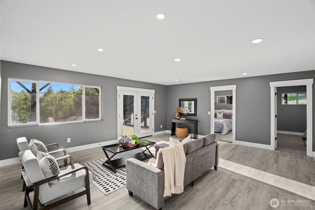 9371 Willamette Meridian Rd NW, Silverdale, WA 98383 - living room featuring french doors, recessed lighting, light wood finished floors, and baseboards