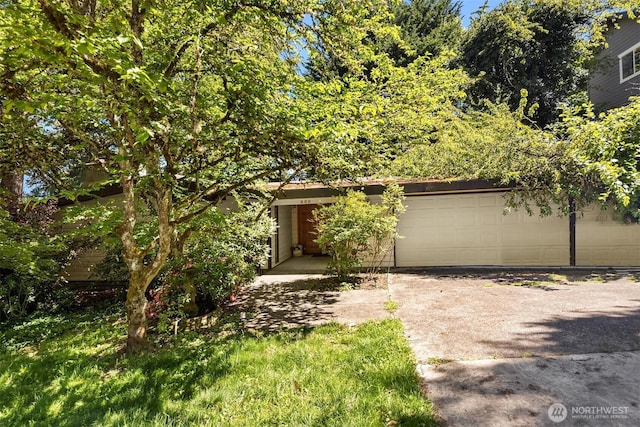 806 101st Ave SE, Bellevue, WA 98004 - obstructed view of property with a garage and driveway