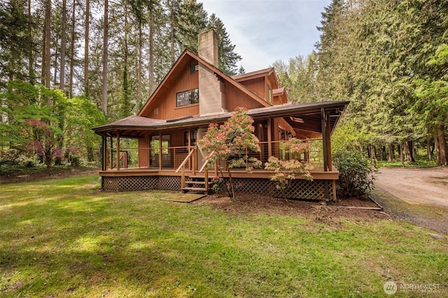377 Stellar Ridge Ln, Sequim, WA 98382 - back of property featuring a chimney and a lawn