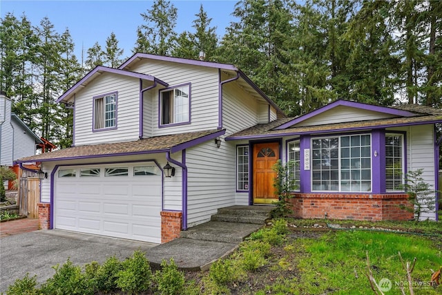 17419 95th Ct E, Puyallup, WA 98375 - split level home featuring asphalt driveway, a garage, brick siding, and a shingled roof