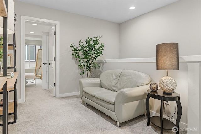 living area with light colored carpet, baseboards, and recessed lighting