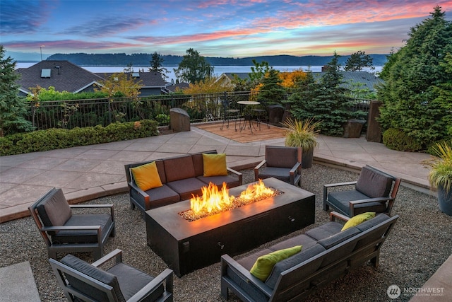 10326 66th Pl W, Mukilteo, WA 98275 - view of patio featuring a mountain view, an outdoor living space with a fire pit, and fence