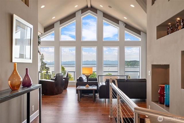 10326 66th Pl W, Mukilteo, WA 98275 - living area featuring wood finished floors, healthy amount of natural light, a water view, high vaulted ceiling, and recessed lighting