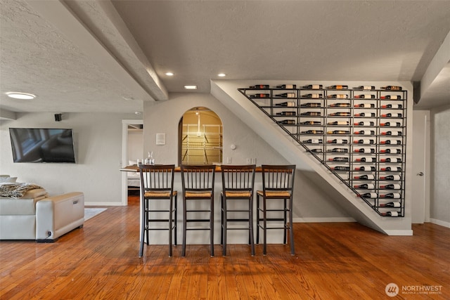 10326 66th Pl W, Mukilteo, WA 98275 - wine cellar with wood-type flooring, baseboards, a textured ceiling, and recessed lighting