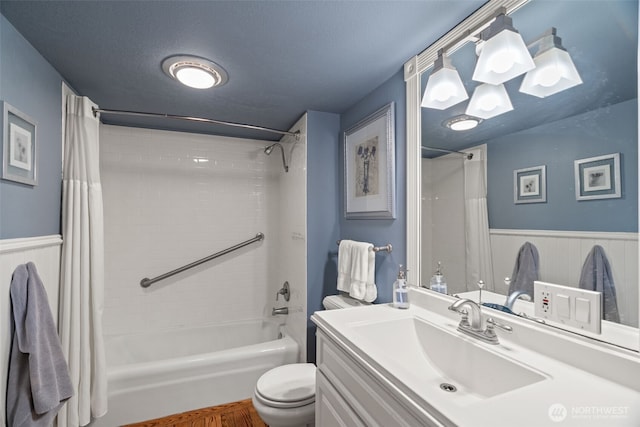 10326 66th Pl W, Mukilteo, WA 98275 - bathroom featuring a wainscoted wall, shower / tub combo, toilet, and vanity